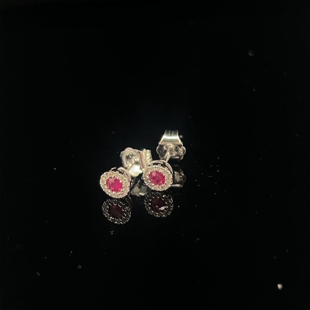 14 kt oorstekers Robijnen Diamant