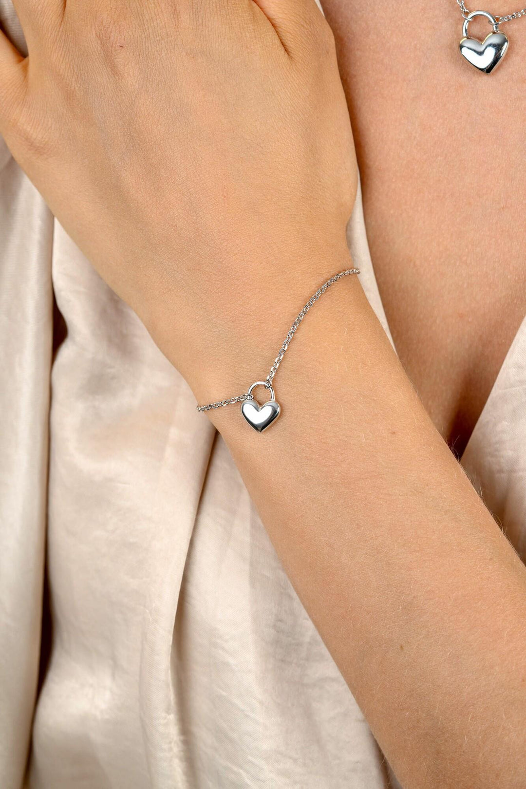 ZINZI zilveren schakelarmband met hartvormige slot hanger 17-20cm ZIA2673