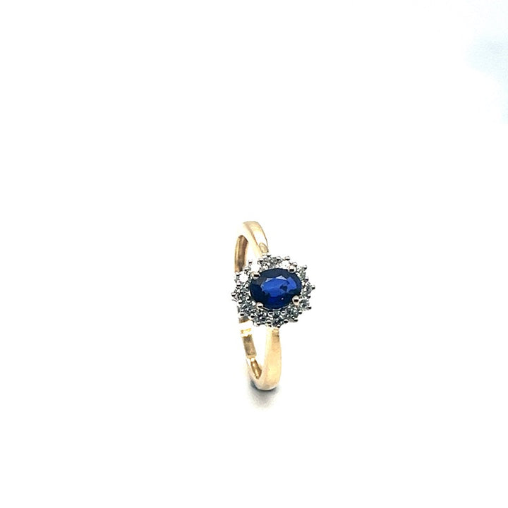 14 kt bicolor ring diamant& saffier Lady Di type