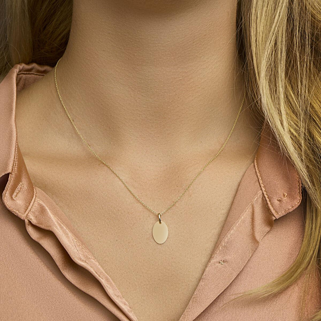 14 kt graveerhanger rond geelgoud 10 mm