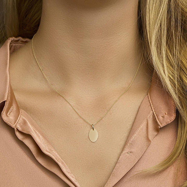14 kt graveerhanger rond geelgoud 10 mm
