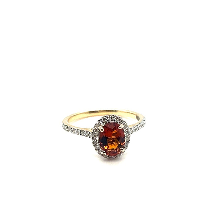 14 kt ring ovaal Tw Si 0.40ct met een Madeira citrien 2.6
