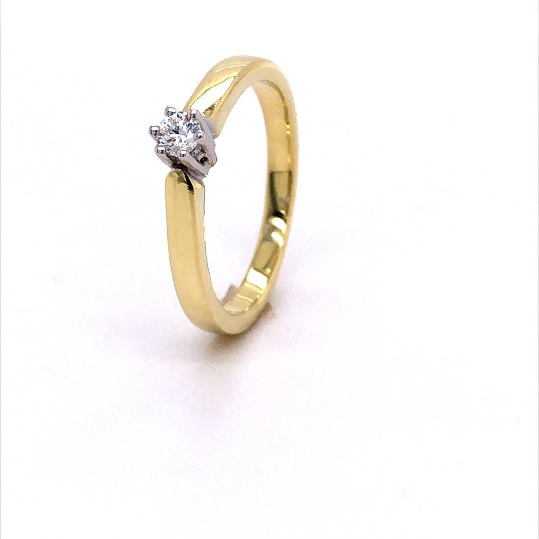 14 kt solitair ring 6 poots 0.70 G/Si2 HDR certificaat