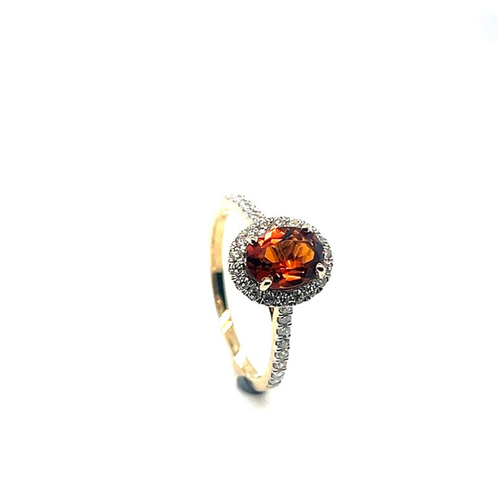 14 kt ring ovaal Tw Si 0.40ct met een Madeira citrien 2.6