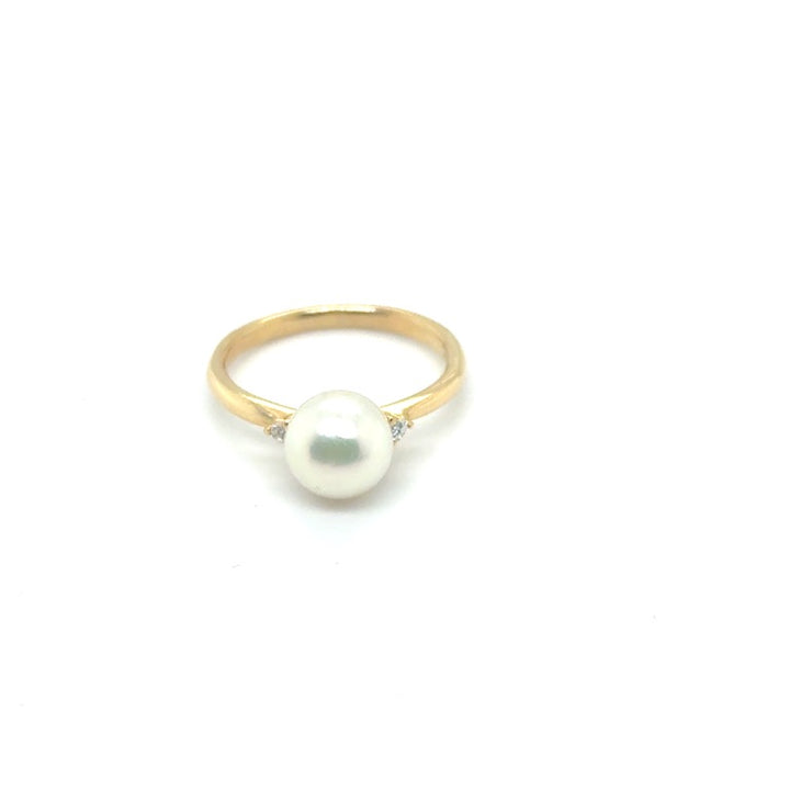 Occasion Parelring 18 kt met Diamant