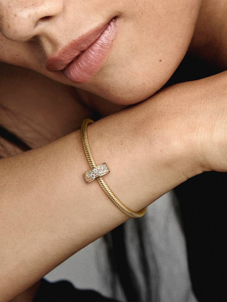 Pandora Moments 768658C01 gold plated clip spacer met siliconen met transparante zirkonia