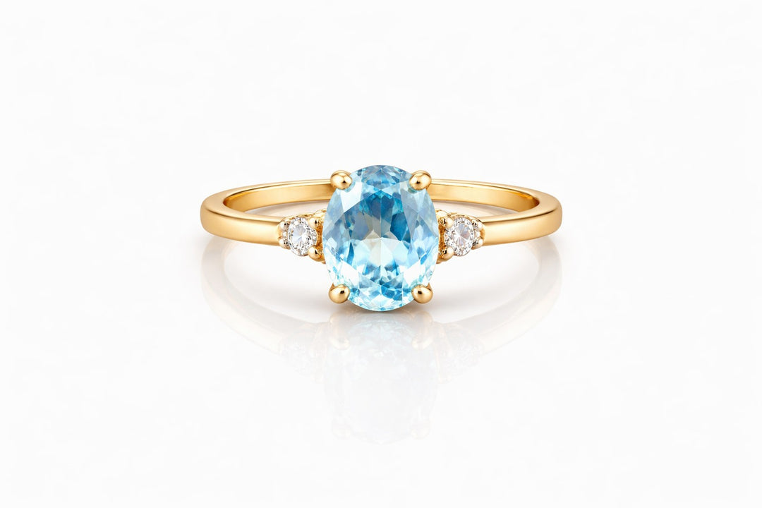 14k Geelgouden Ring met Sky Blue Topaas en Diamant