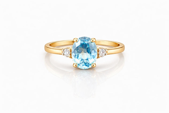 14k Geelgouden Ring met Sky Blue Topaas en Diamant