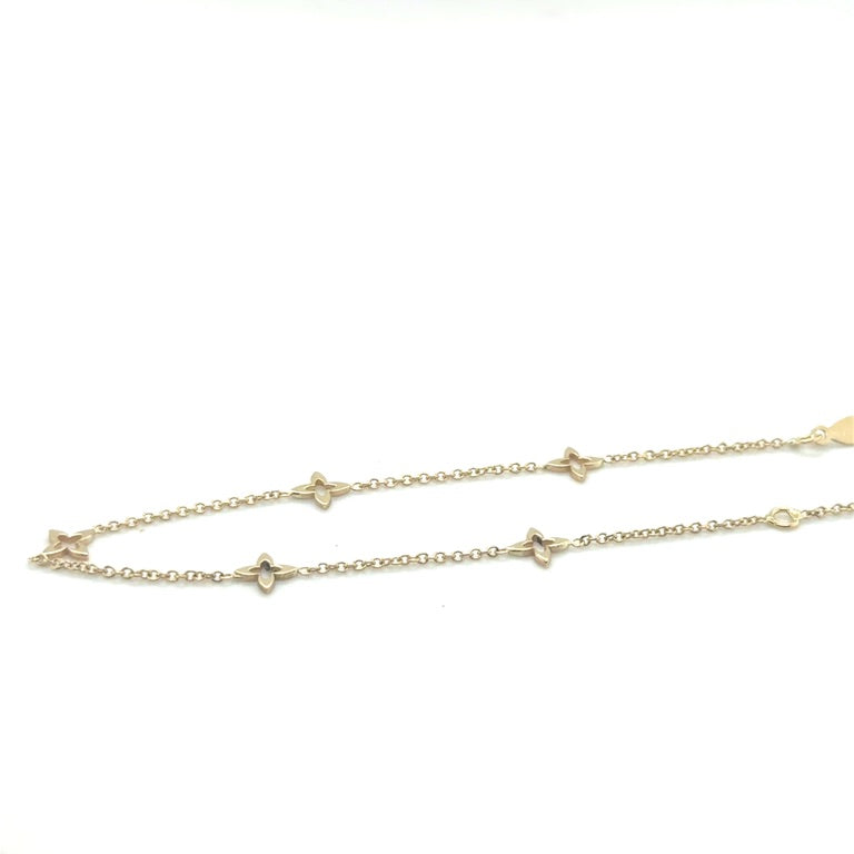 14 karaat geelgouden armband met 5 lelies 17 - 19 cm