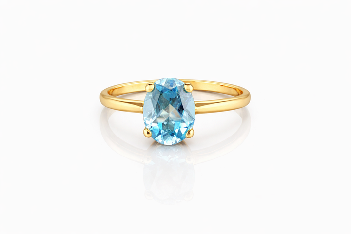 14 kt gdn ring met London Blue Topaas
