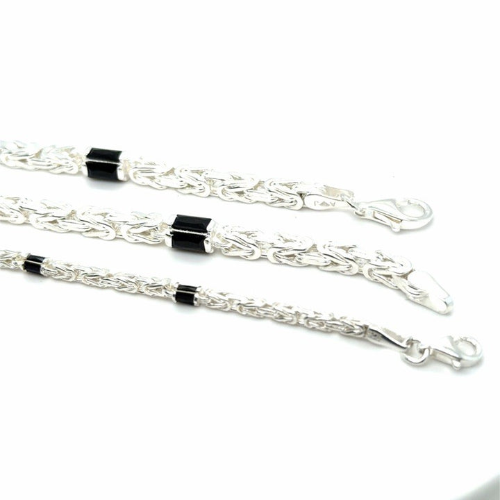 Zilveren Massieve Koningsschakel Armband 4 mm met Onyx – 22 cm