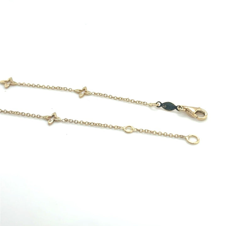 14 karaat geelgouden armband met 5 lelies 17 - 19 cm