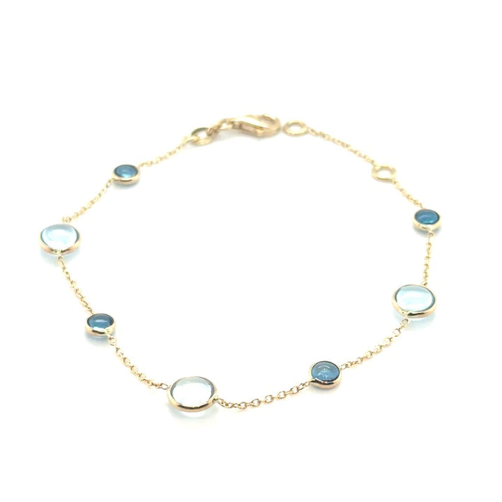 14 karaat geelgouden armband met Sky Blue en London Blue Topaas – 17-19 cm
