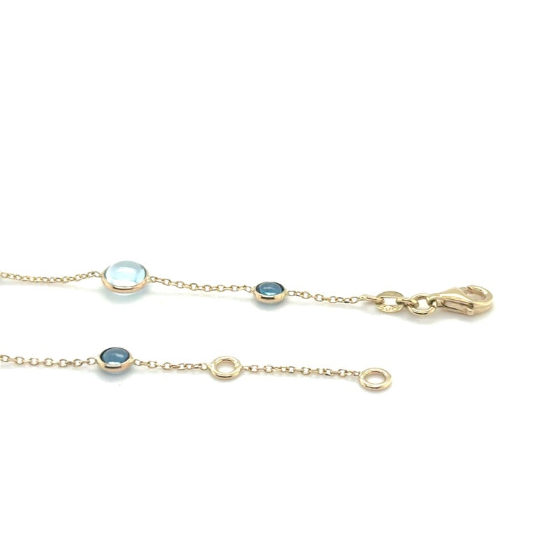 14 karaat geelgouden armband met Sky Blue en London Blue Topaas – 17-19 cm