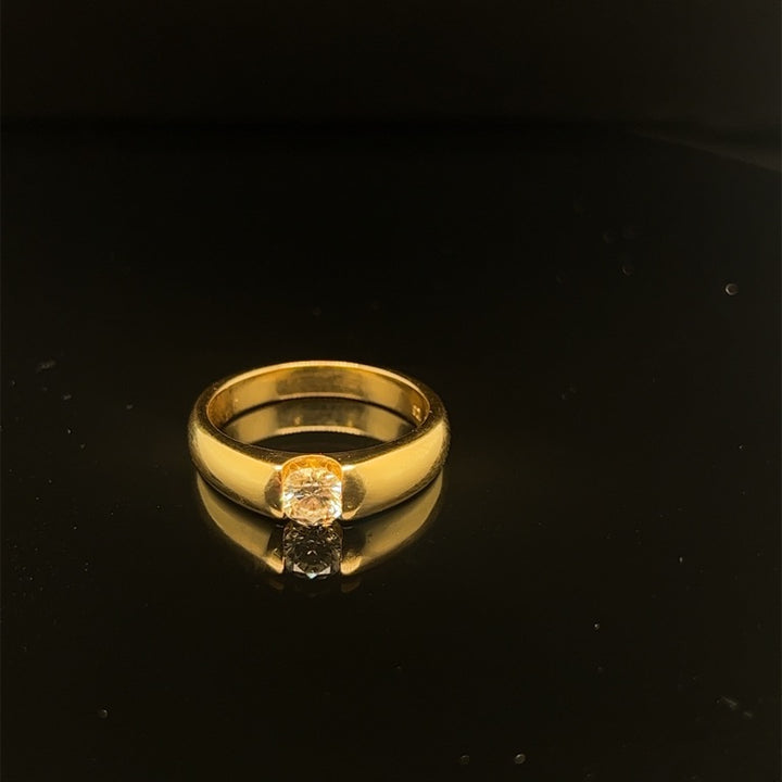 18 kt massieve kogelring met een 0.46ct G Si1 diamant gezet